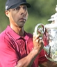 Tiger Woods modello alzando un bicchiere per dare un volto a questa pagina. Creare un fotomontaggio per salvare o e-mail ai tuoi amici.