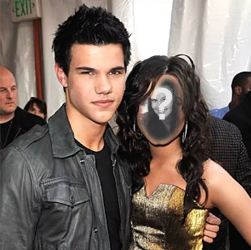 Hai una foto come una donna accanto a Taylor Lautner, artista marziale, attore noto per la saga di Twilight. Su di un lato e salvare o inviare e-mail..