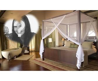 fotomontaggio un romantico hotel un bel letto e bagno in camera e cornice forma di cuore per mettere vostra foto